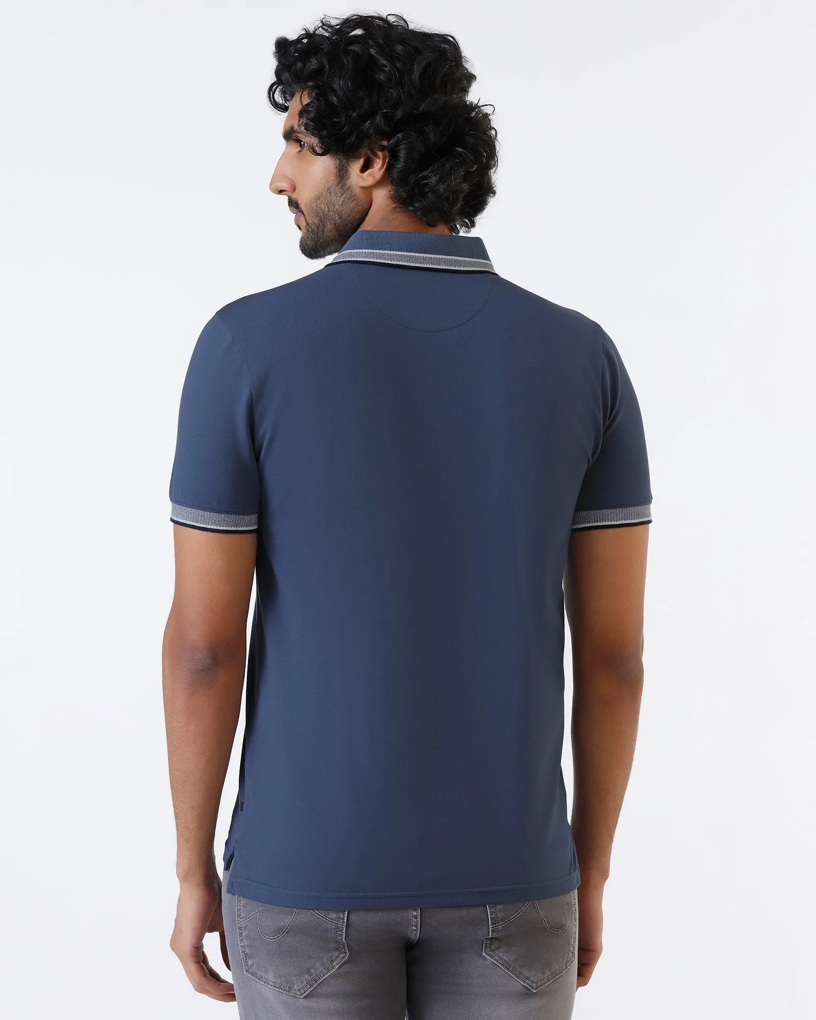 Timeless Wearable Curved Hemline Mid Blue Solid Polo - Taurus