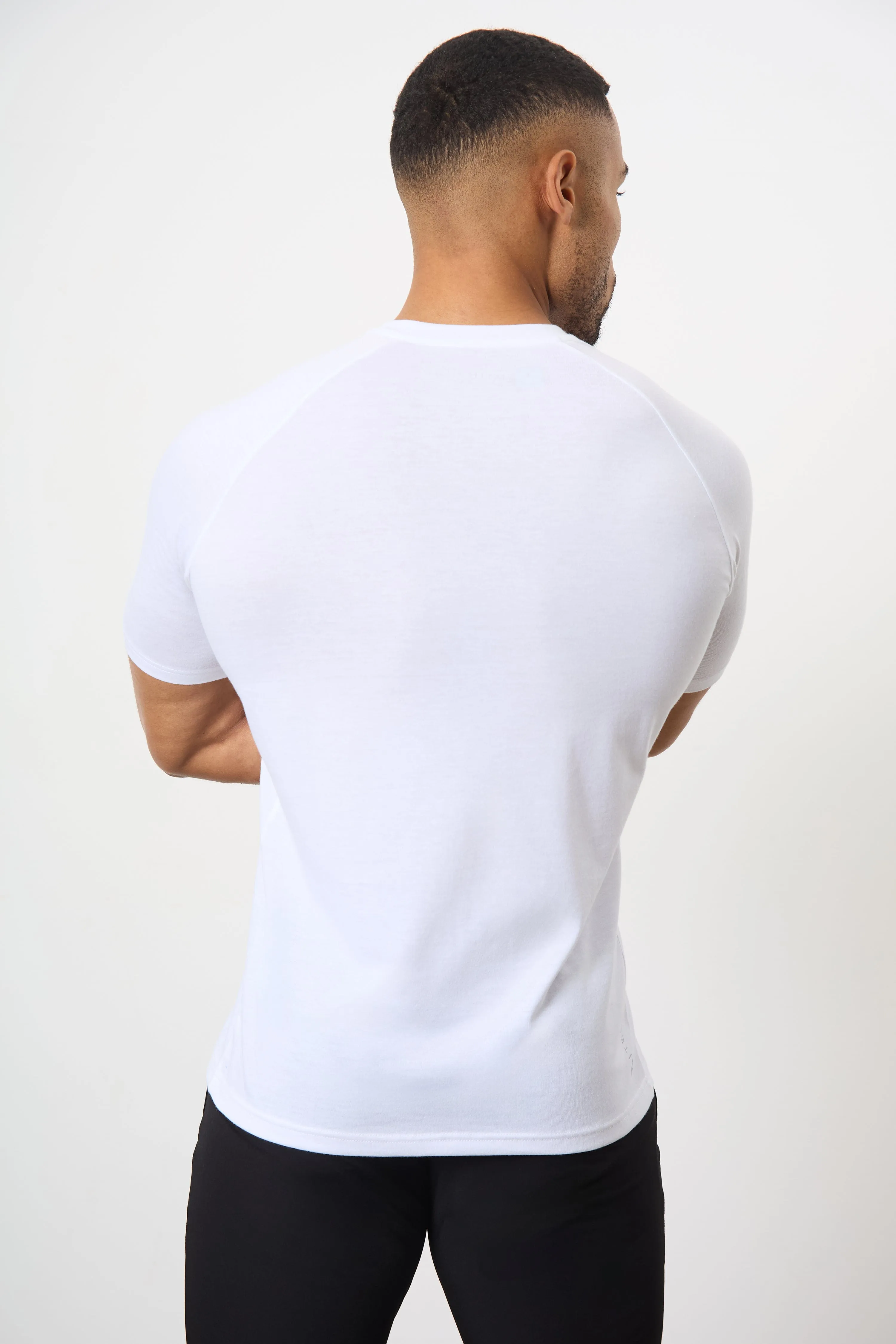 Non Restrictive Cut Essential Training Top in White